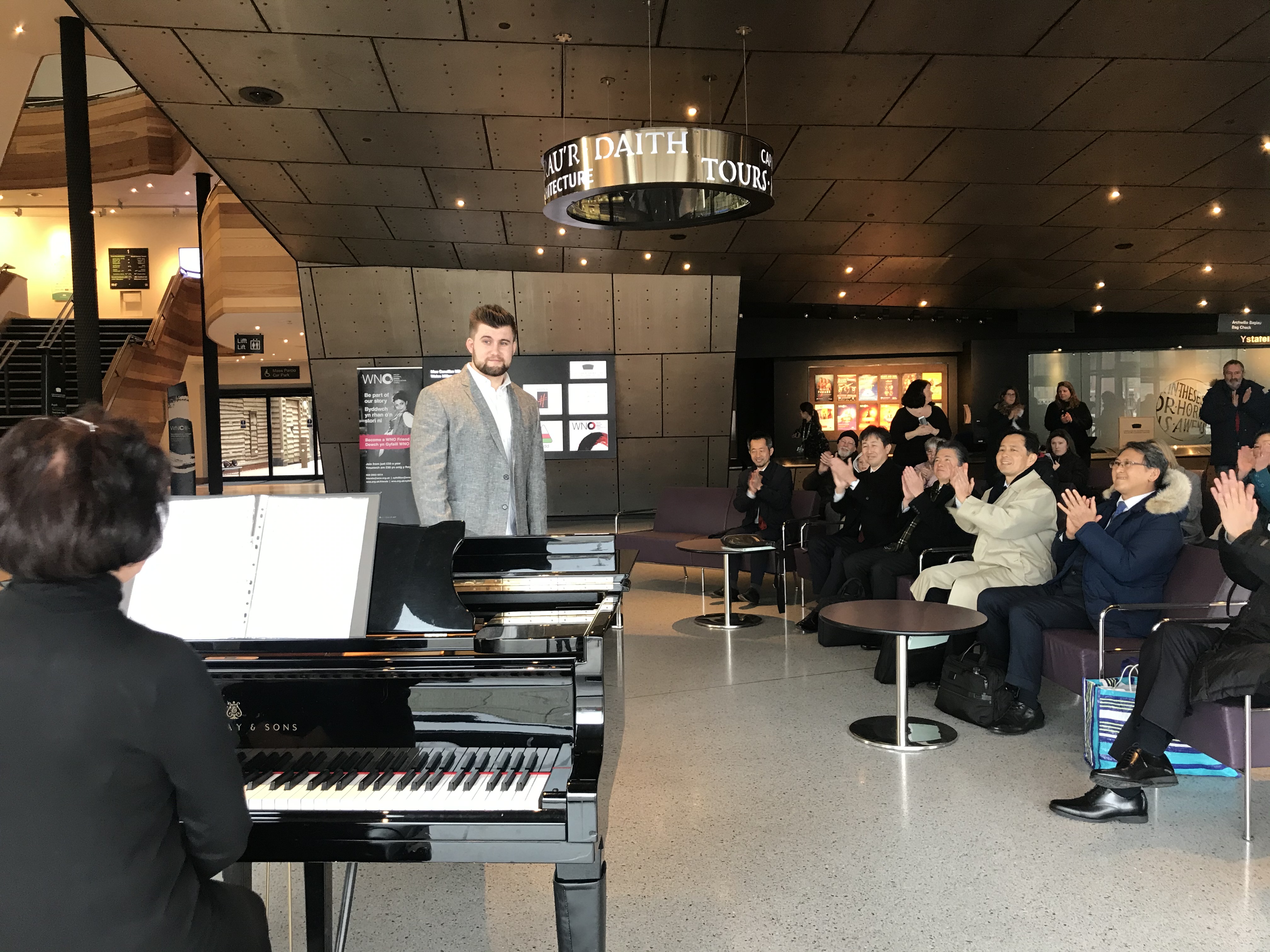 Performance by Rhydian Jenkins, winner of the 2019 Bryn Terfel Urdd Scholarship, for Mayor of Kitakyshua with the region's senior officials visiting Wales in February 2020