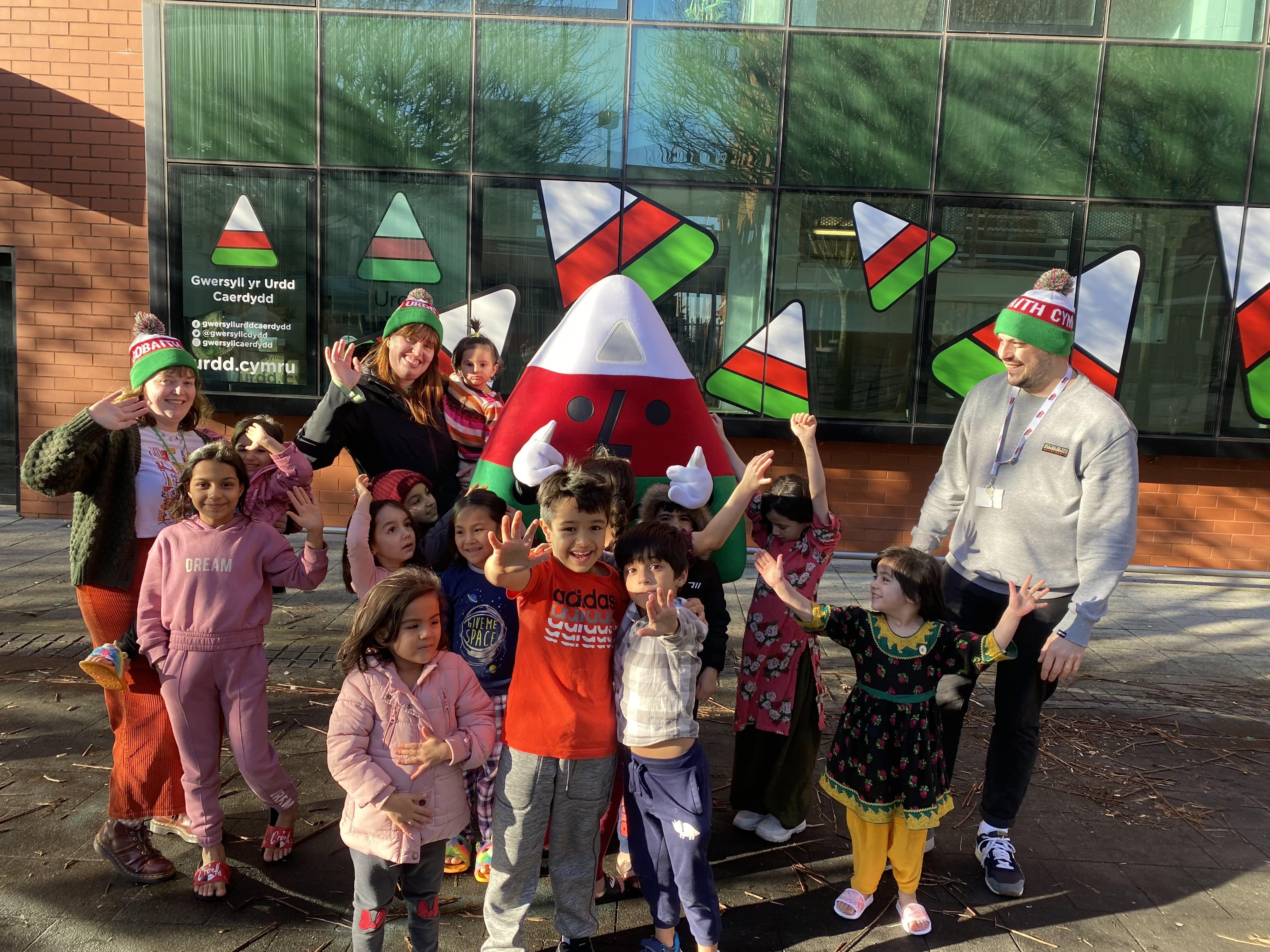 Children meet mascot Mr Urdd, Cardiff Residential Centre